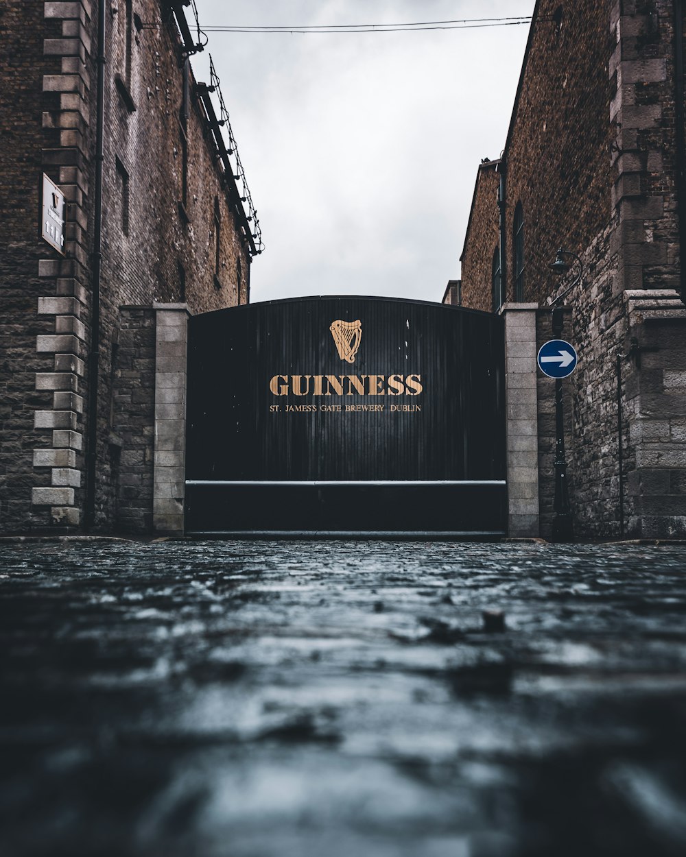a guinness sign on the side of a building