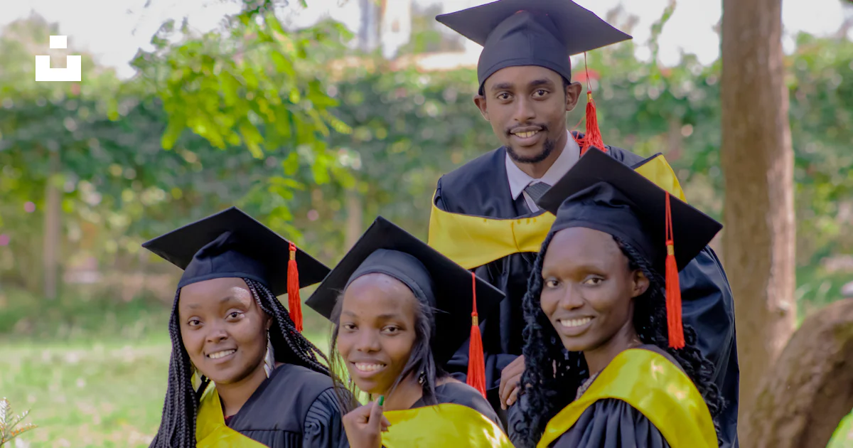 Graduation Kenya A group of people in graduation gowns posing for a picture photo – Free ...