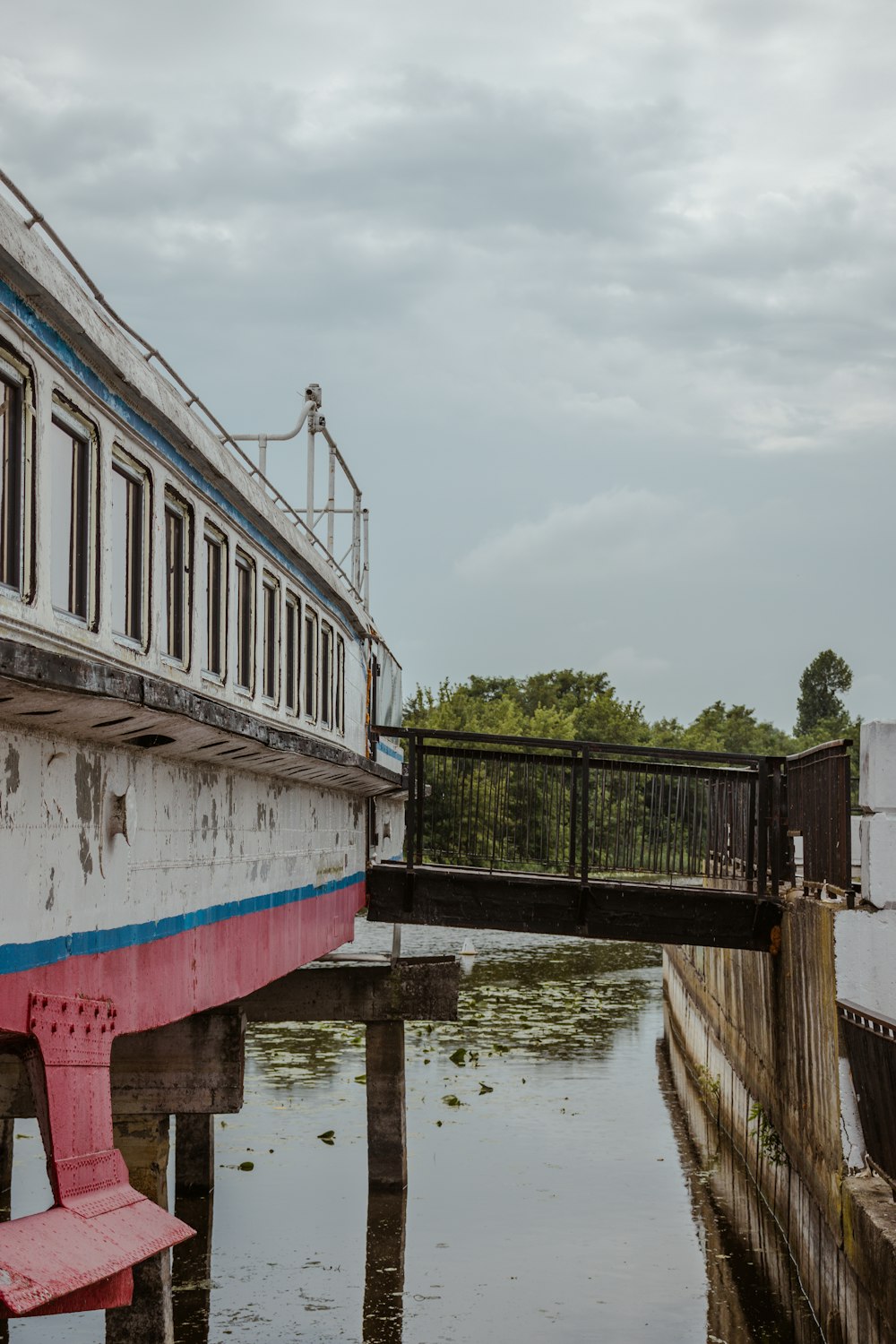 a boat sitting on top of a body of water