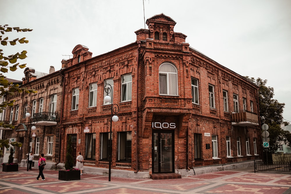 an old brick building with a clock tower on top of it