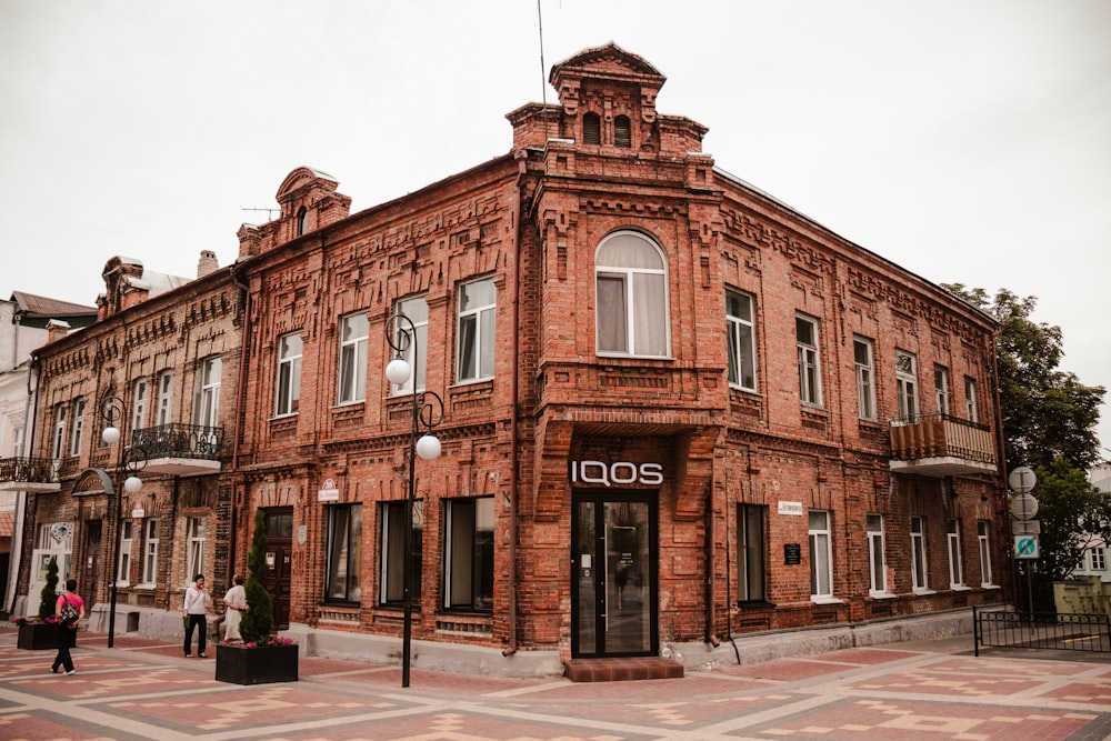 an old brick building with a clock tower on top of it