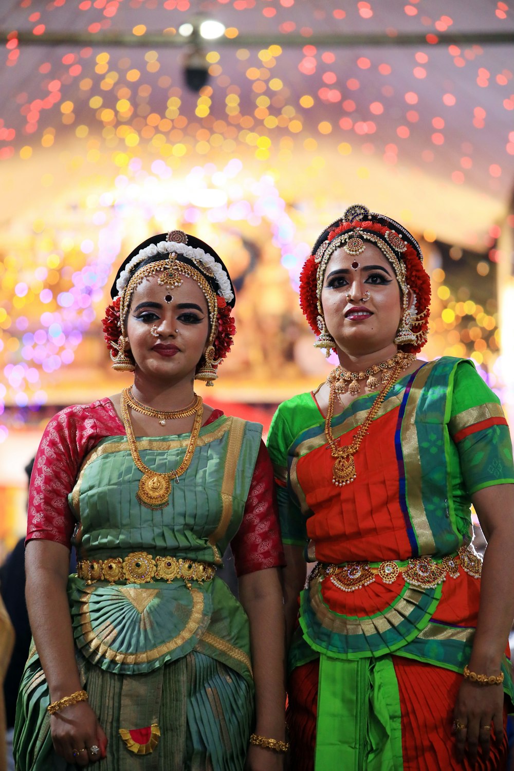 a couple of women standing next to each other