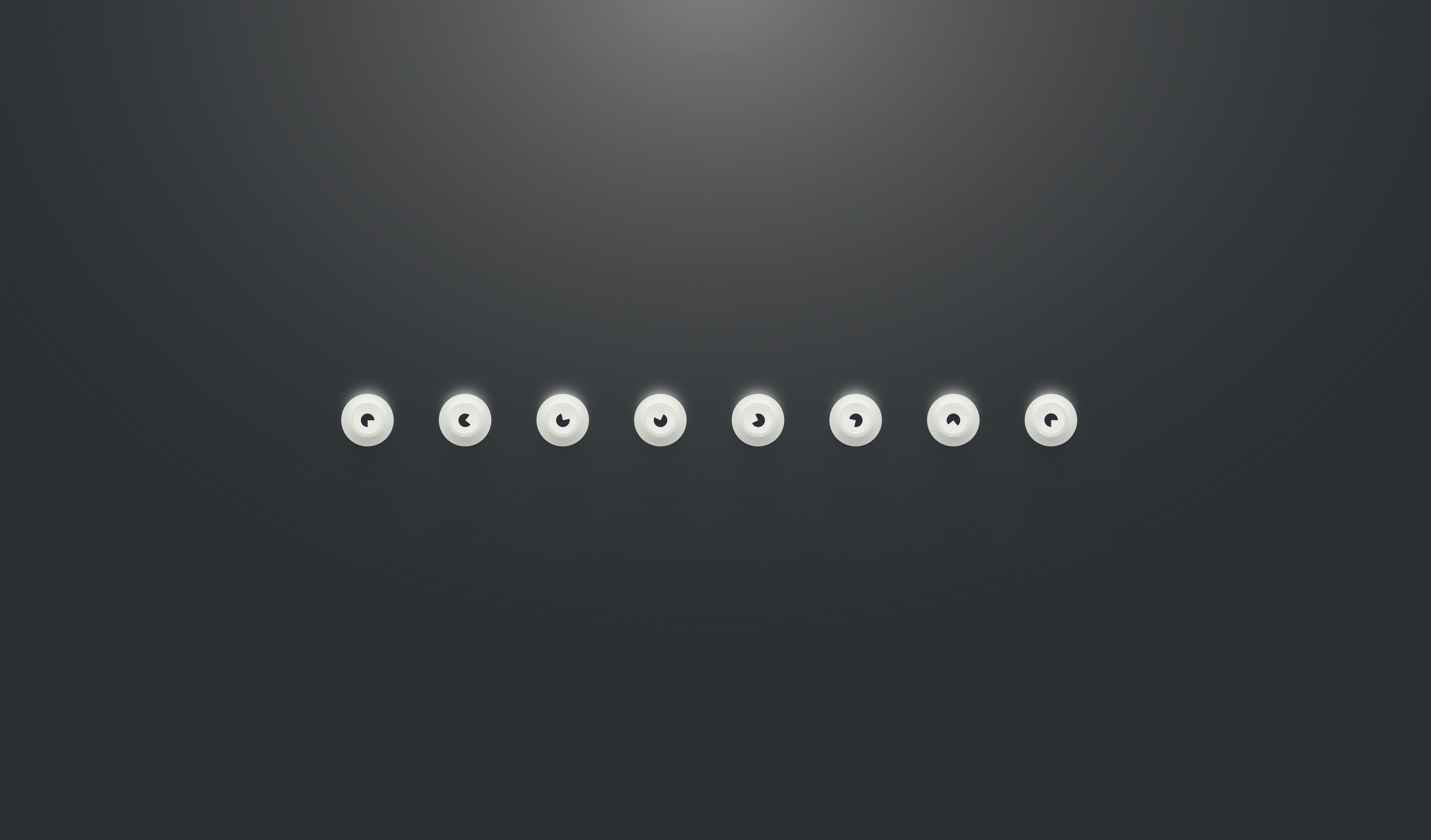 Abstract dark background with minimal circular disk shapes.