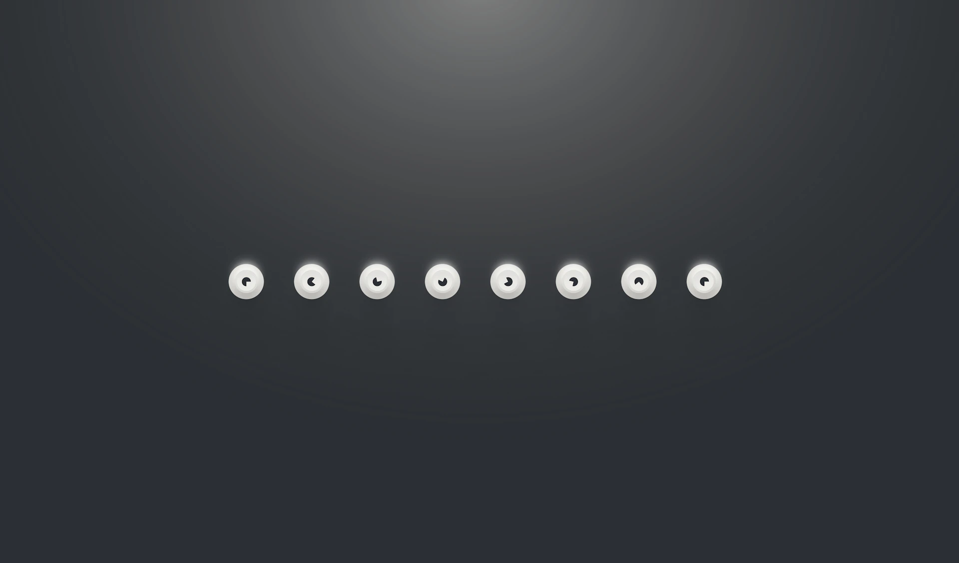 a black and white photo of a row of buttons