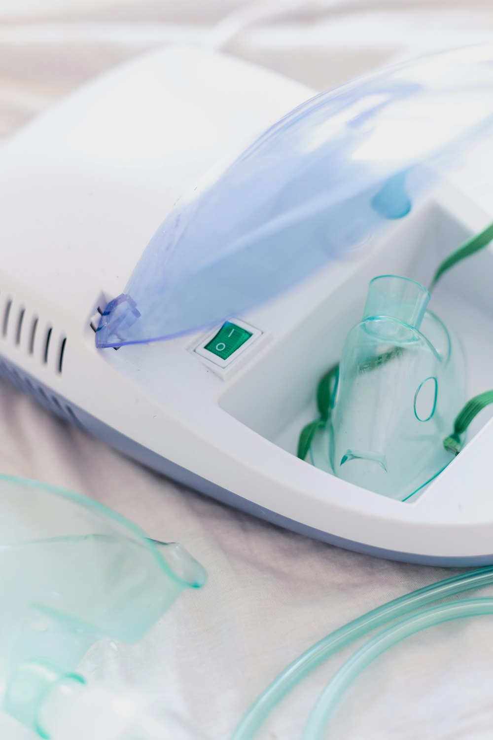 a close up of an electric device with a toothbrush in it