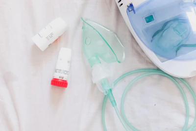 an iv and a tube laying on a bed