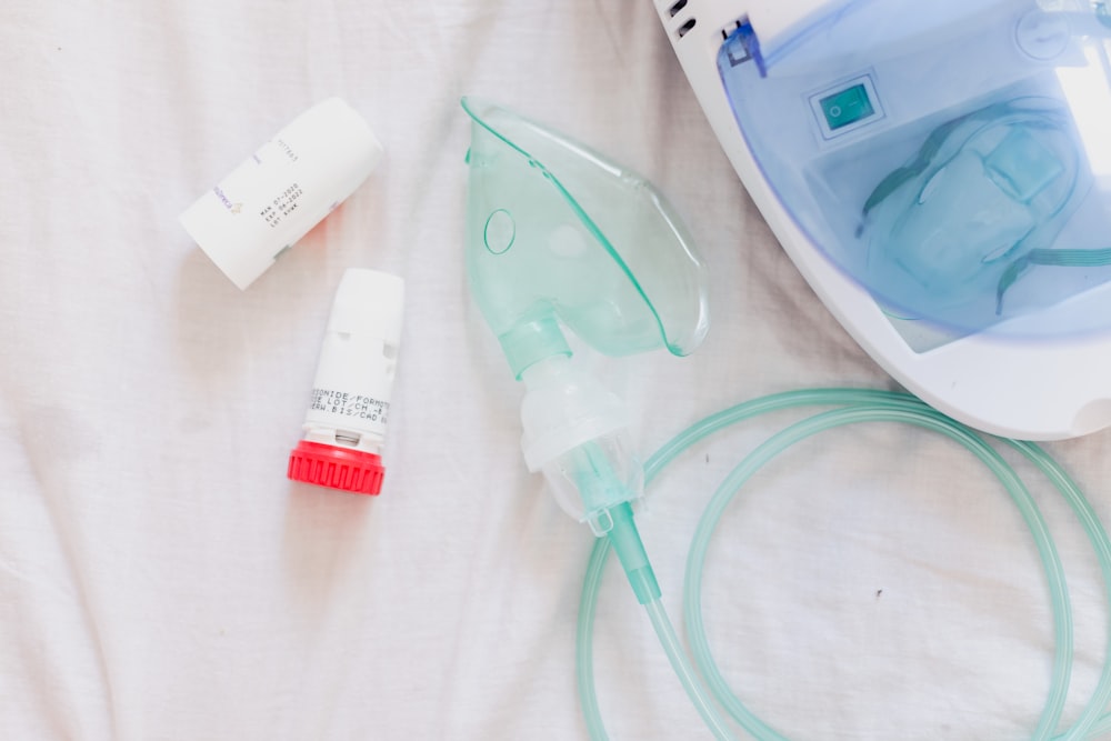 an iv and a tube laying on a bed