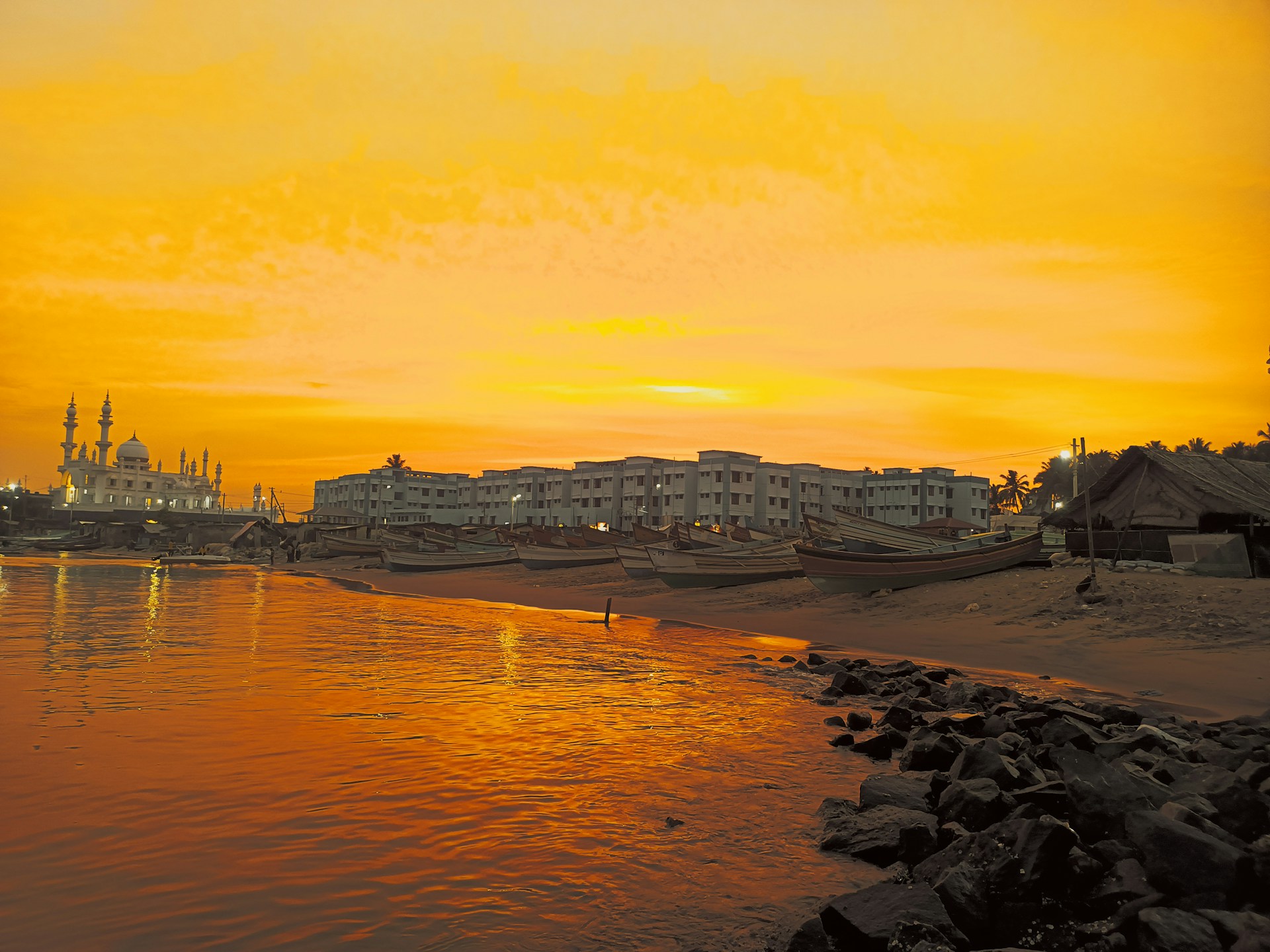 woman wearing yellow long-sleeved dress under white clouds and blue sky during daytime