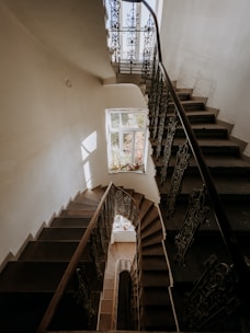 a stair case with a window on the top of it