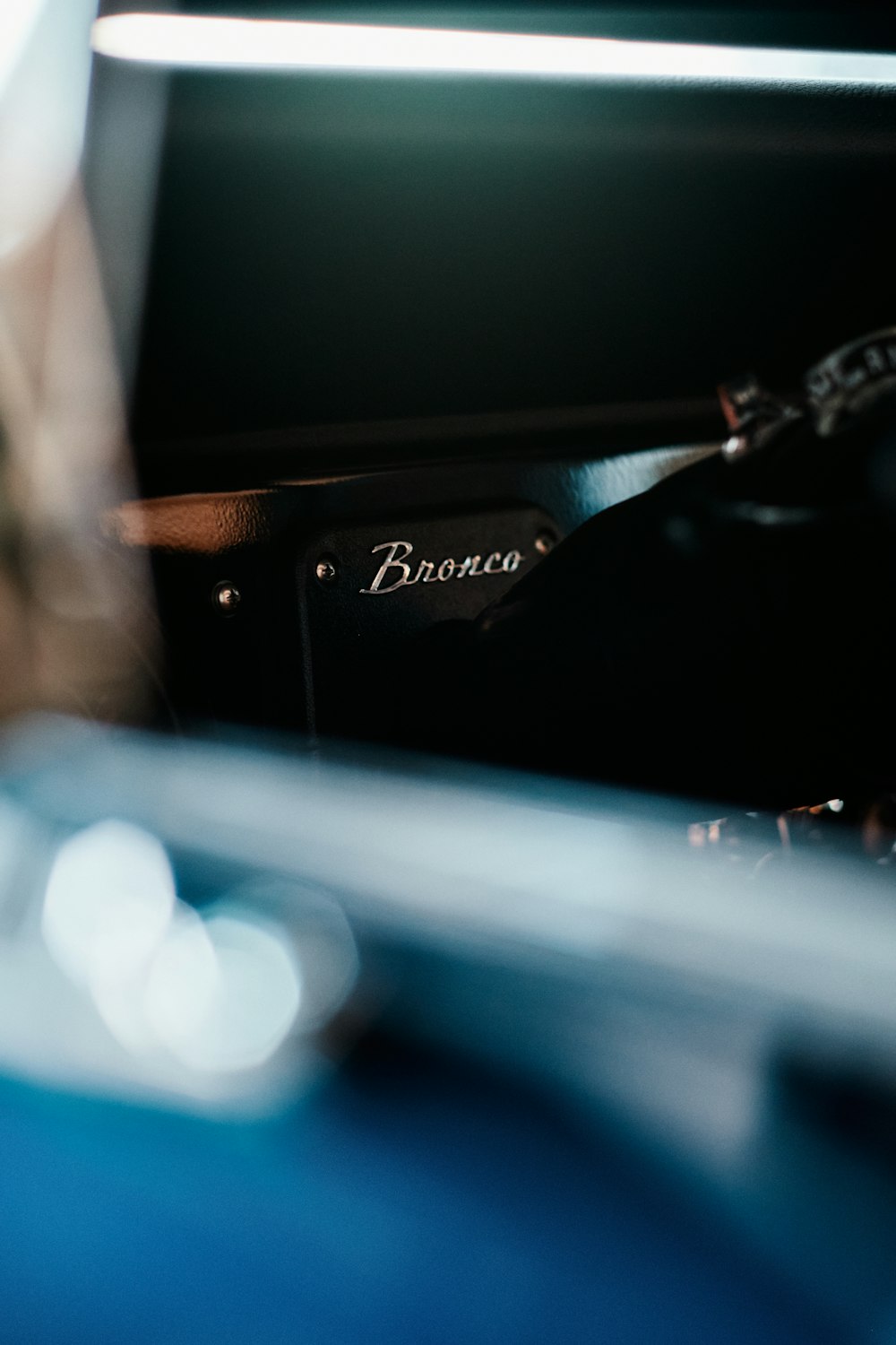 a close up of a car dashboard with the word bronco on it