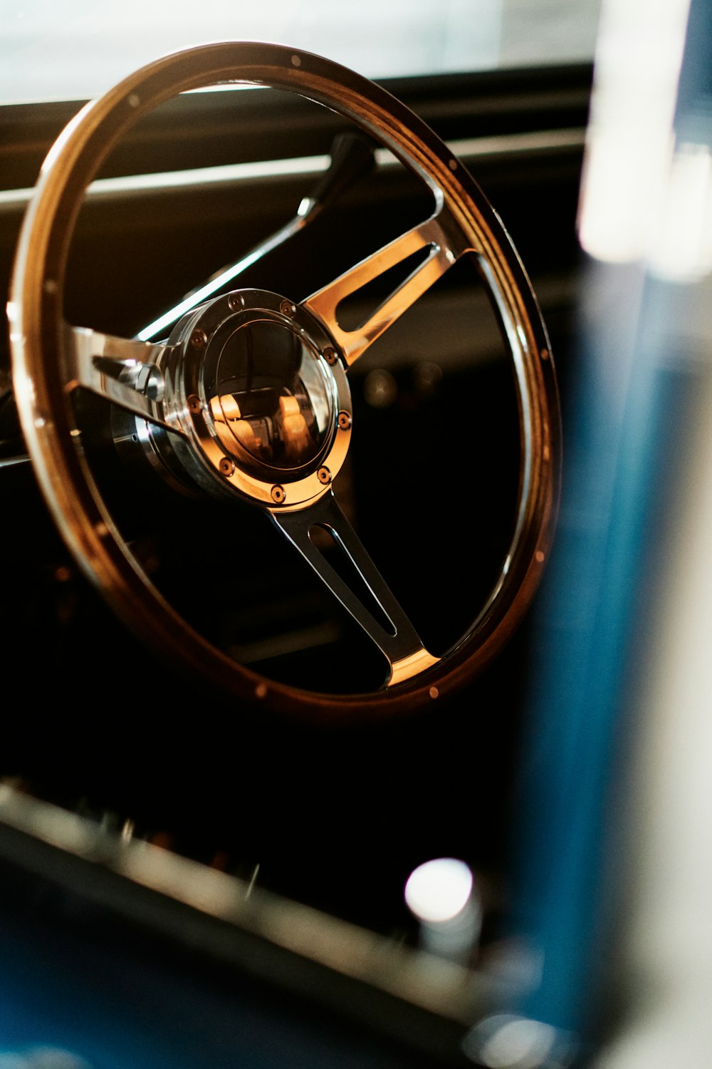 a close up of a steering wheel on a car