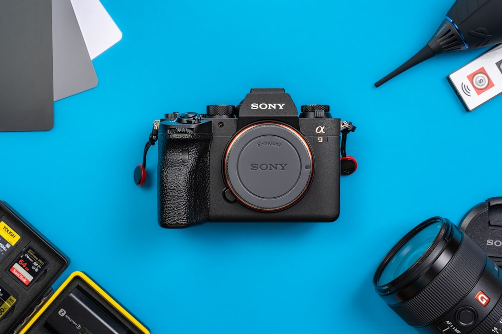 a camera sitting on top of a blue table