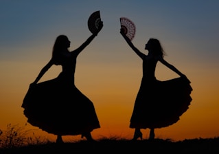 a couple of women standing next to each other