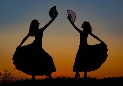 a couple of women standing next to each other