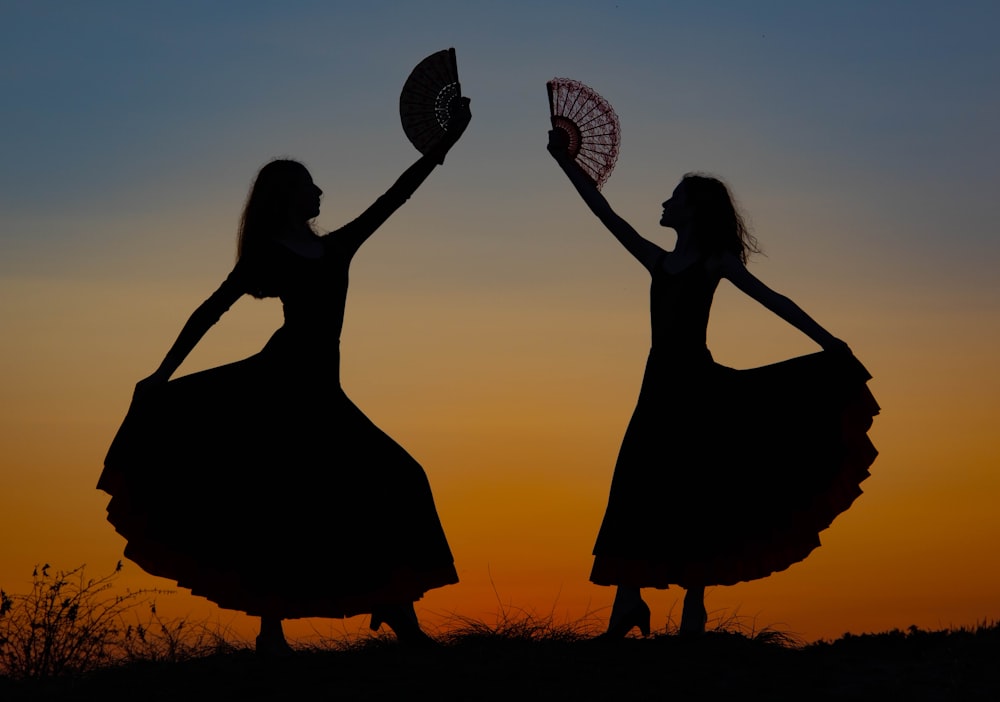 a couple of women standing next to each other