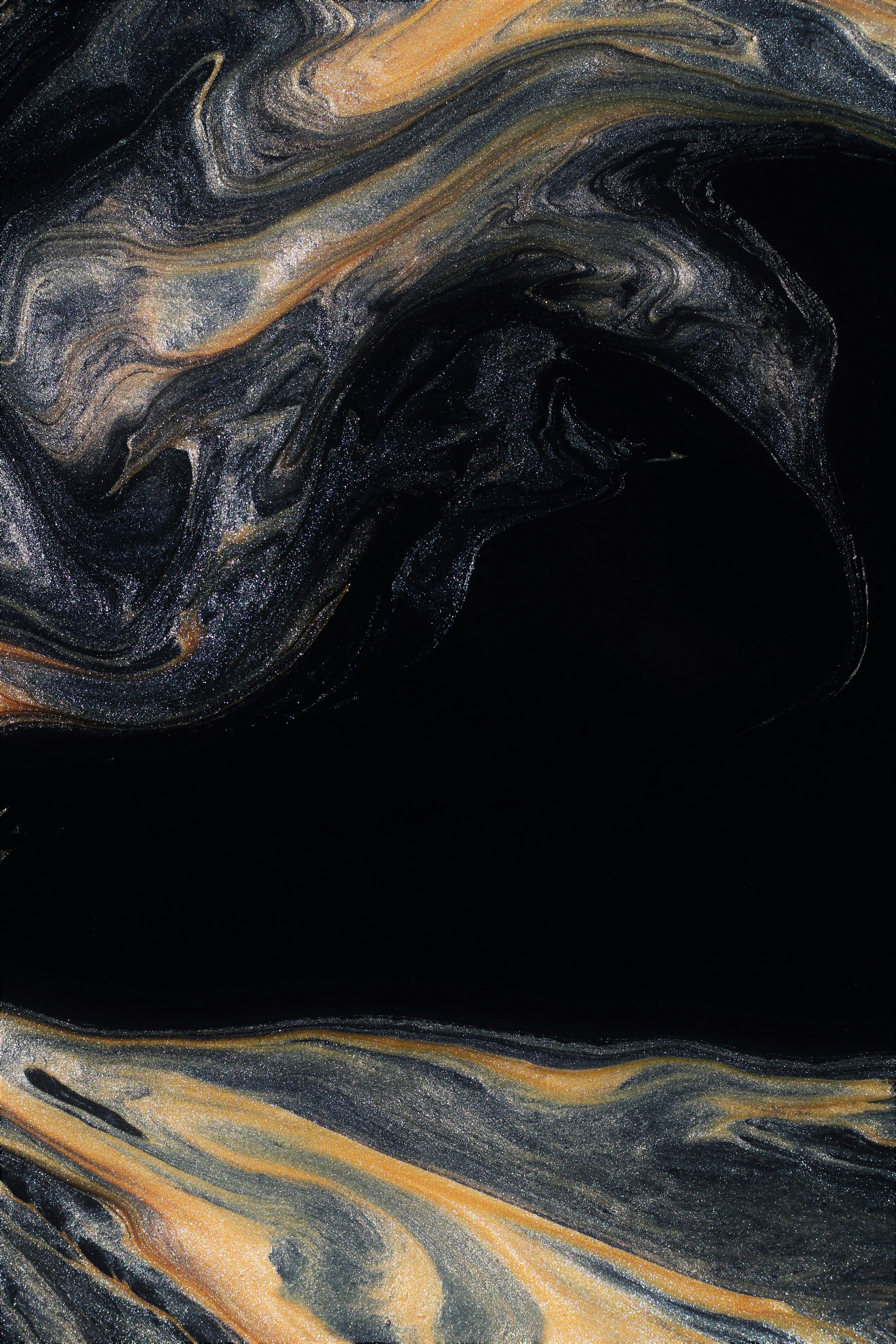 a close up of a black and yellow swirl