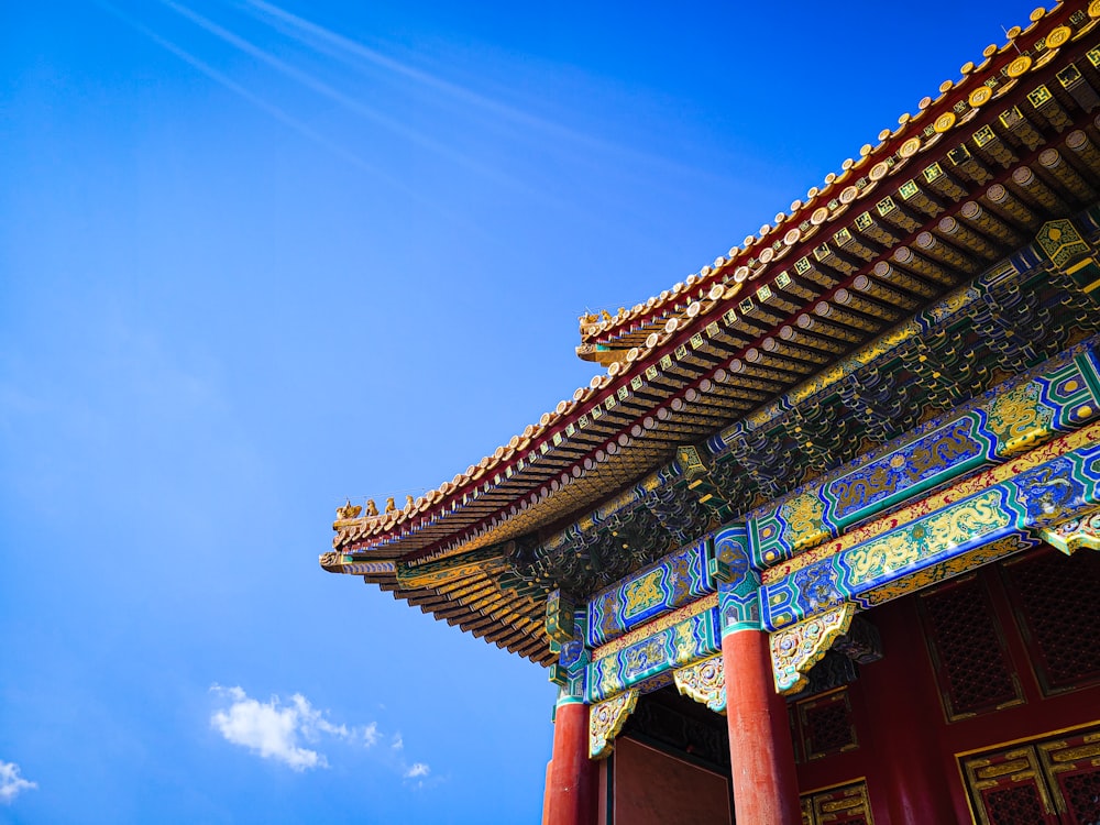 a tall building with a sky in the background