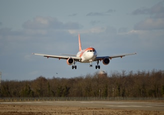 an airplane taking off from an airport runway