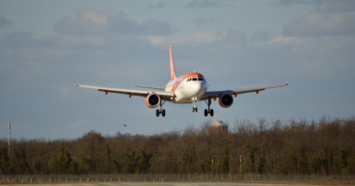 an airplane taking off from an airport runway