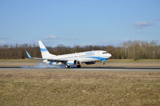 a large jetliner taking off from an airport runway