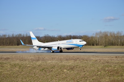 a large jetliner taking off from an airport runway