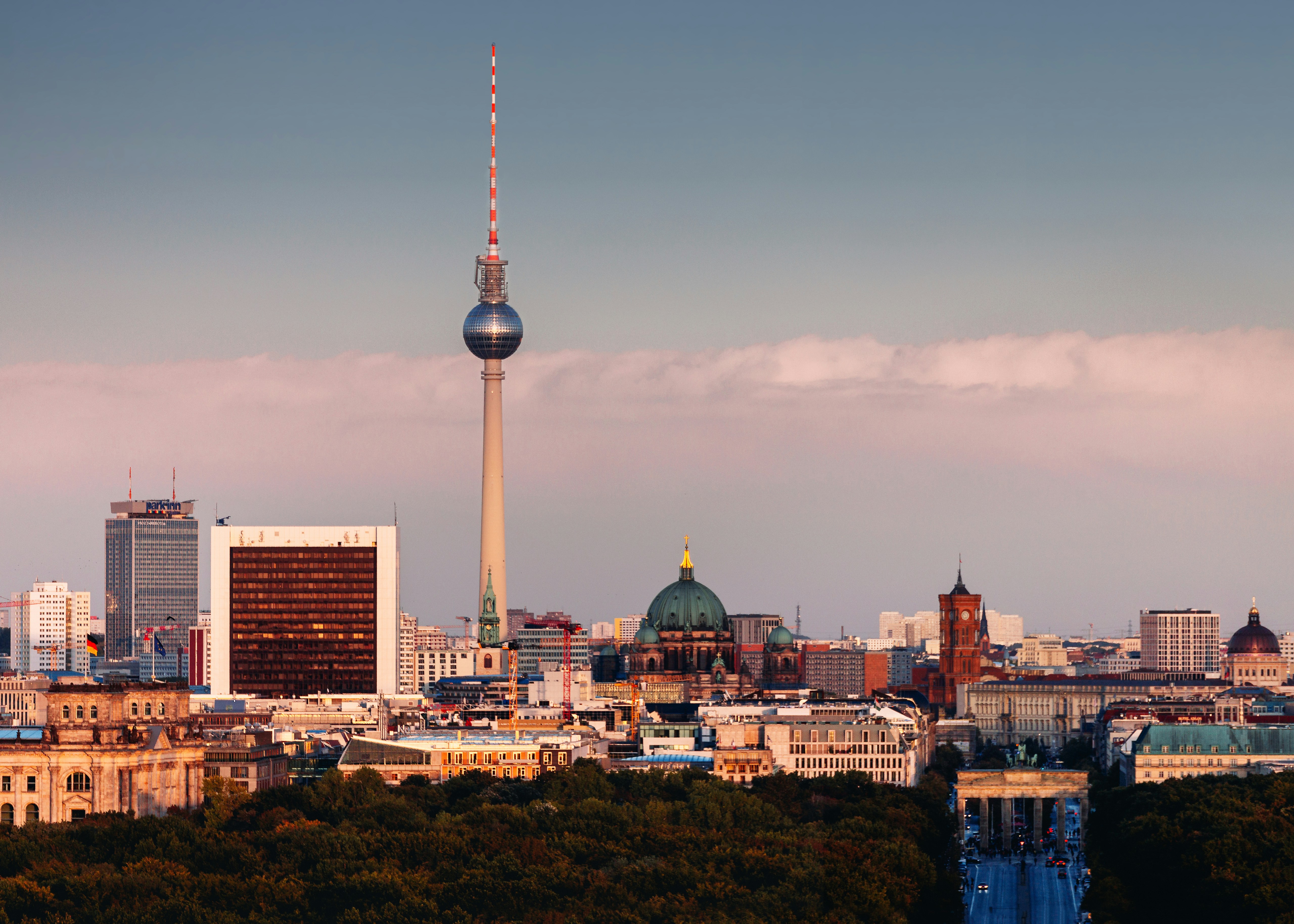 a view of a city with tall buildings and a television tower