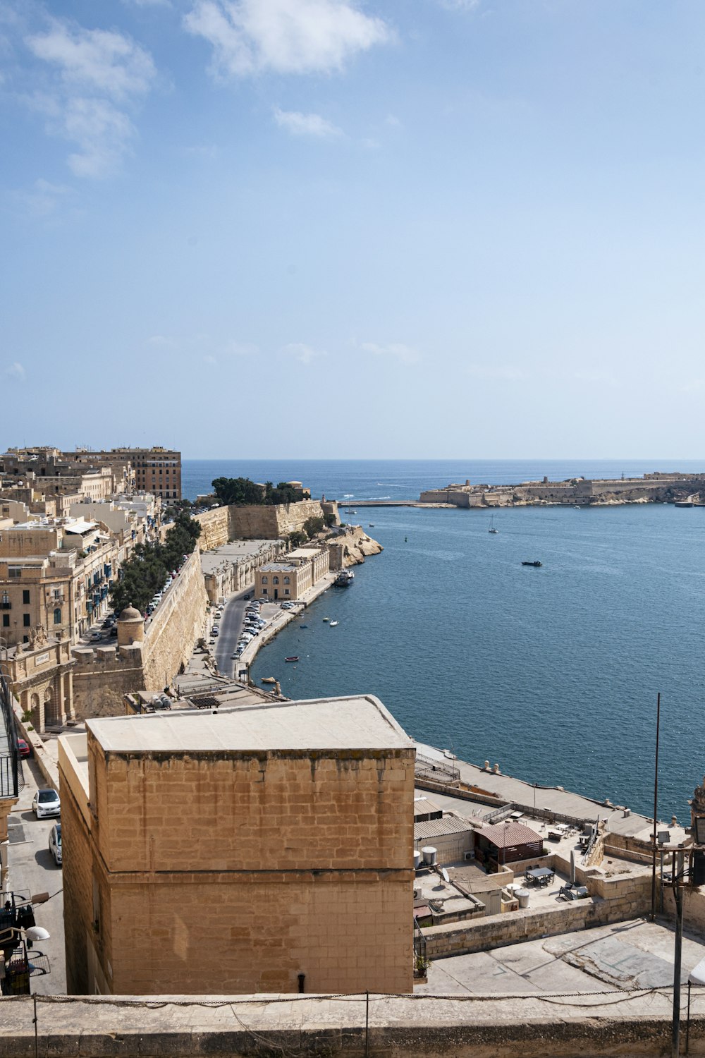 a large body of water next to a city