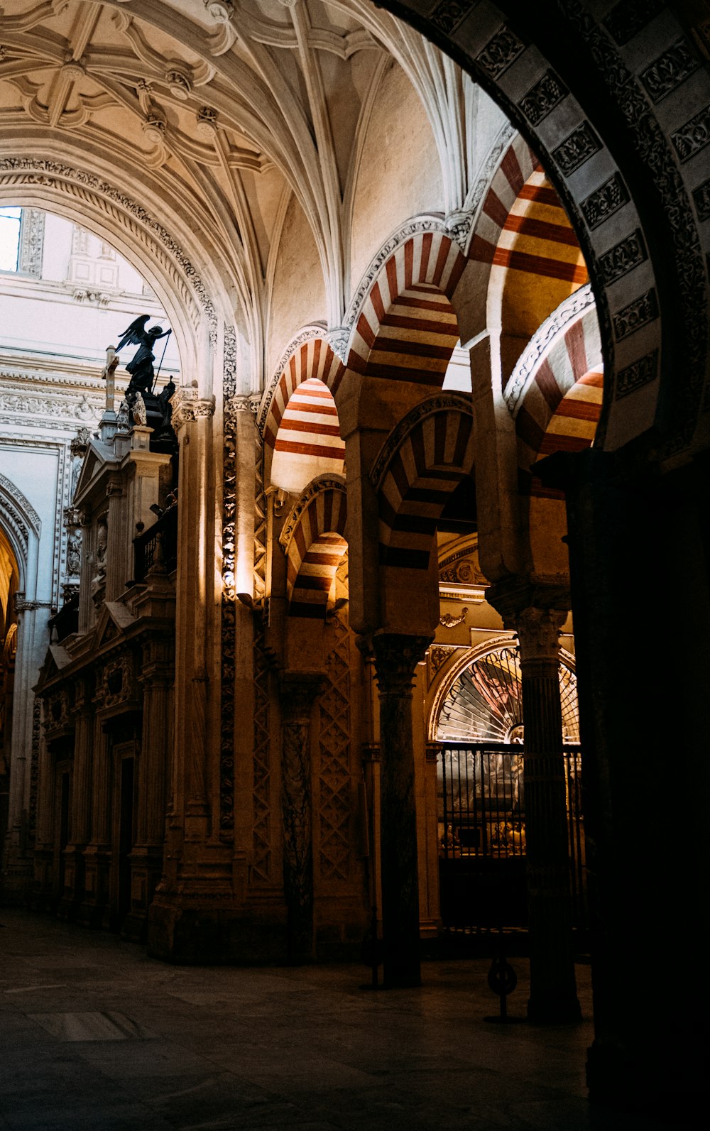 a cathedral with a statue of a man on a horse