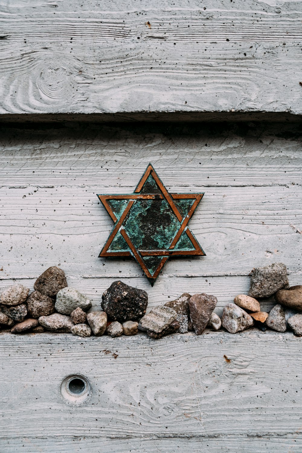 a star of david on a wooden wall