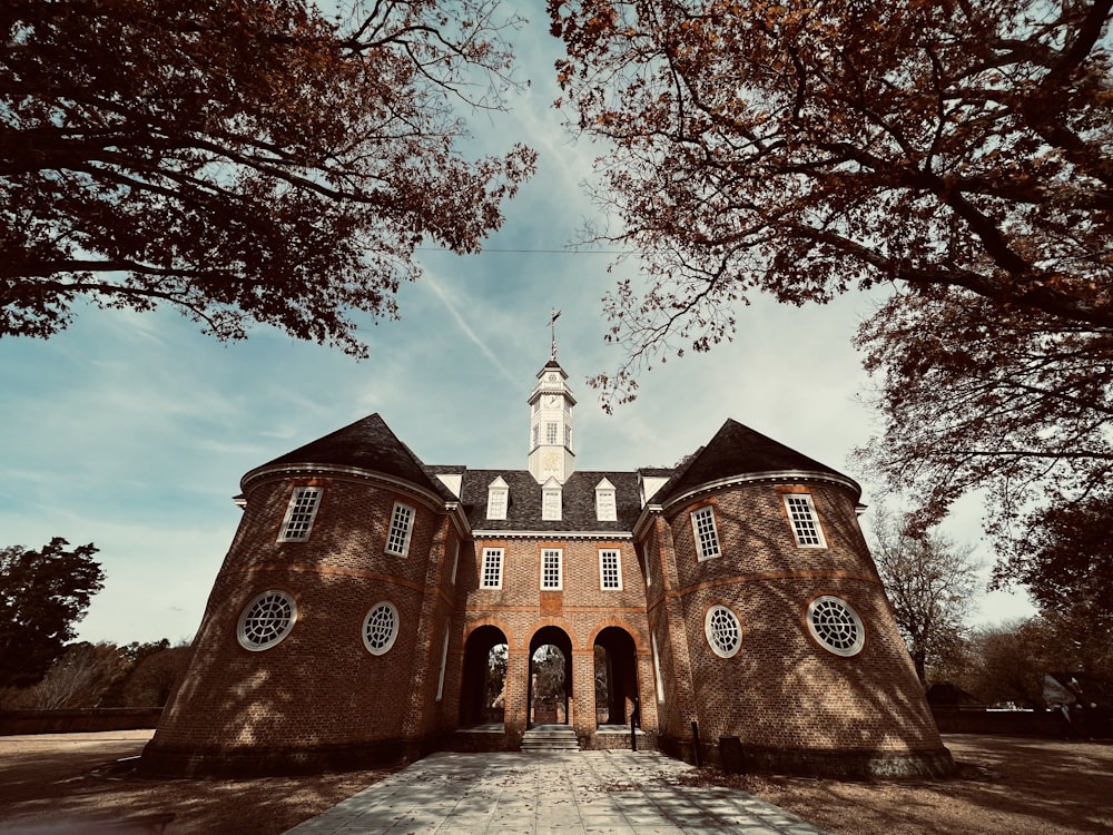 a large brick building with a clock tower