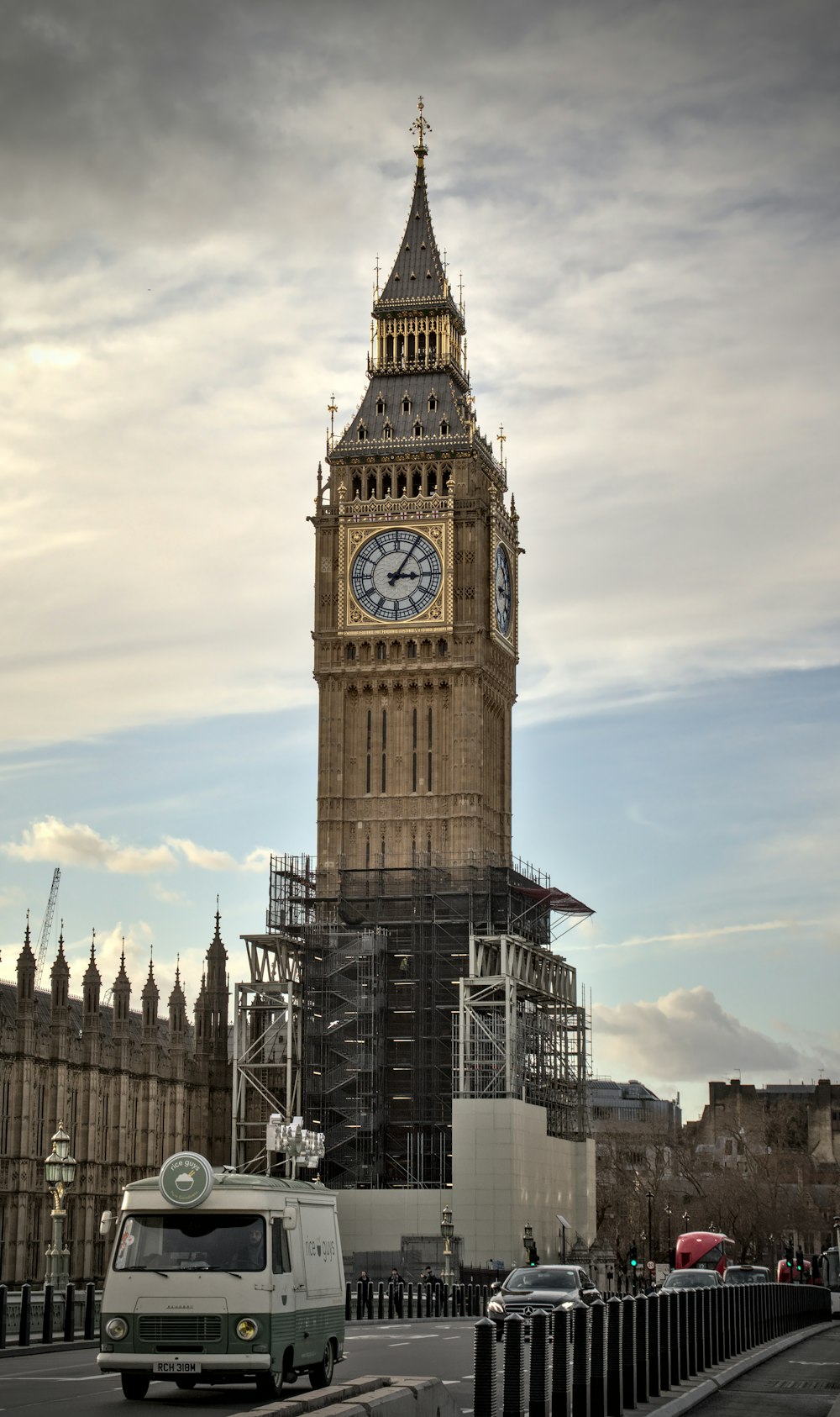 a large clock tower with scaffolding around it