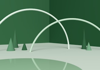 a green room with three white trees and a green wall