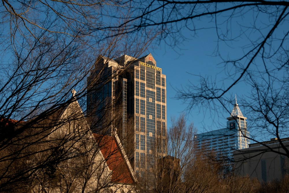 a view of a building through some trees