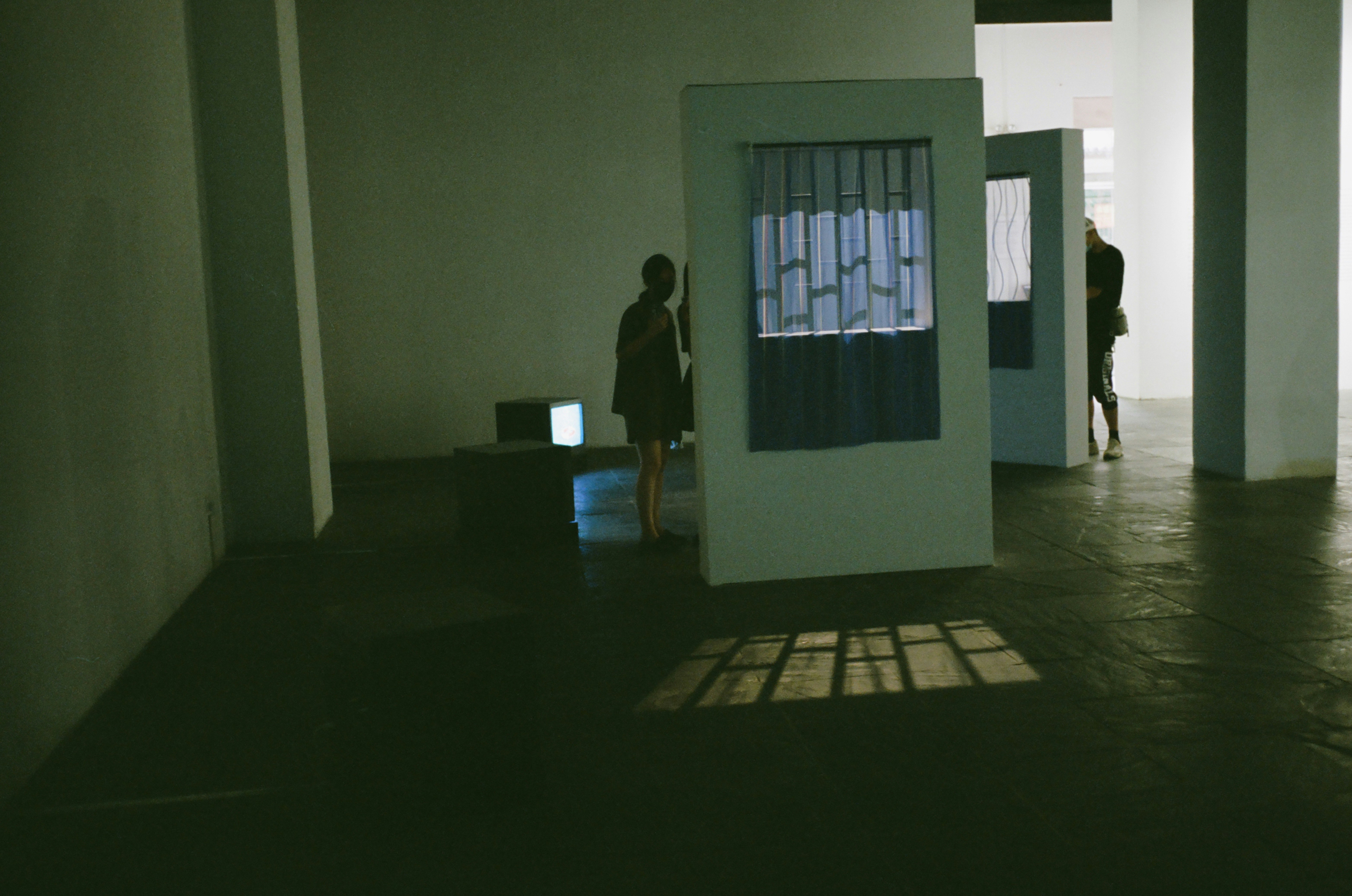 a couple of people that are standing in a room