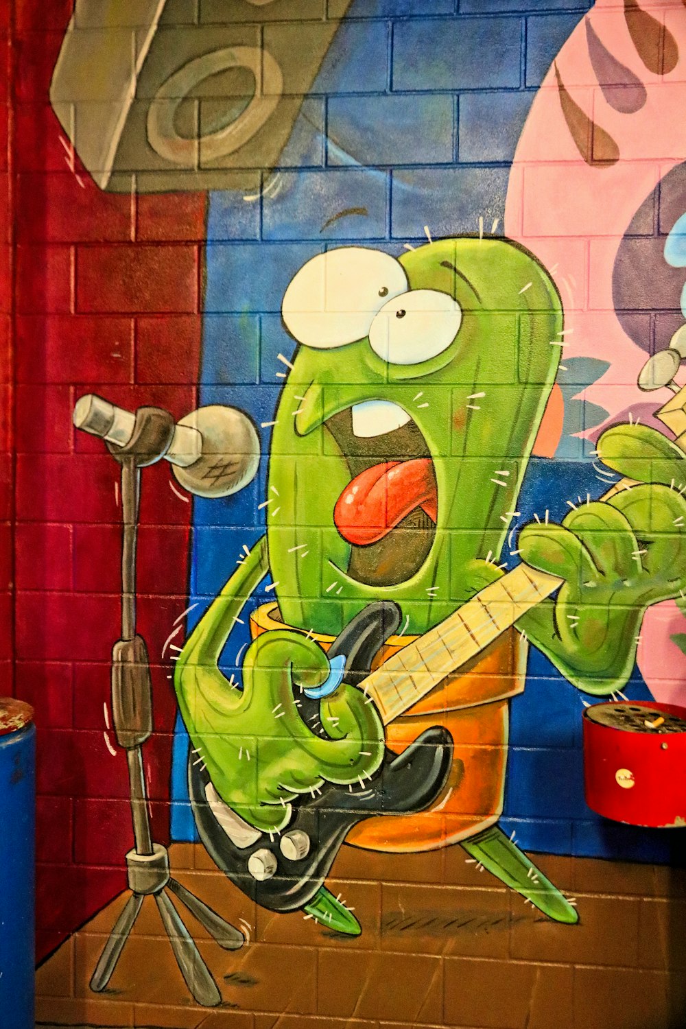 a painting of a cartoon character playing a guitar