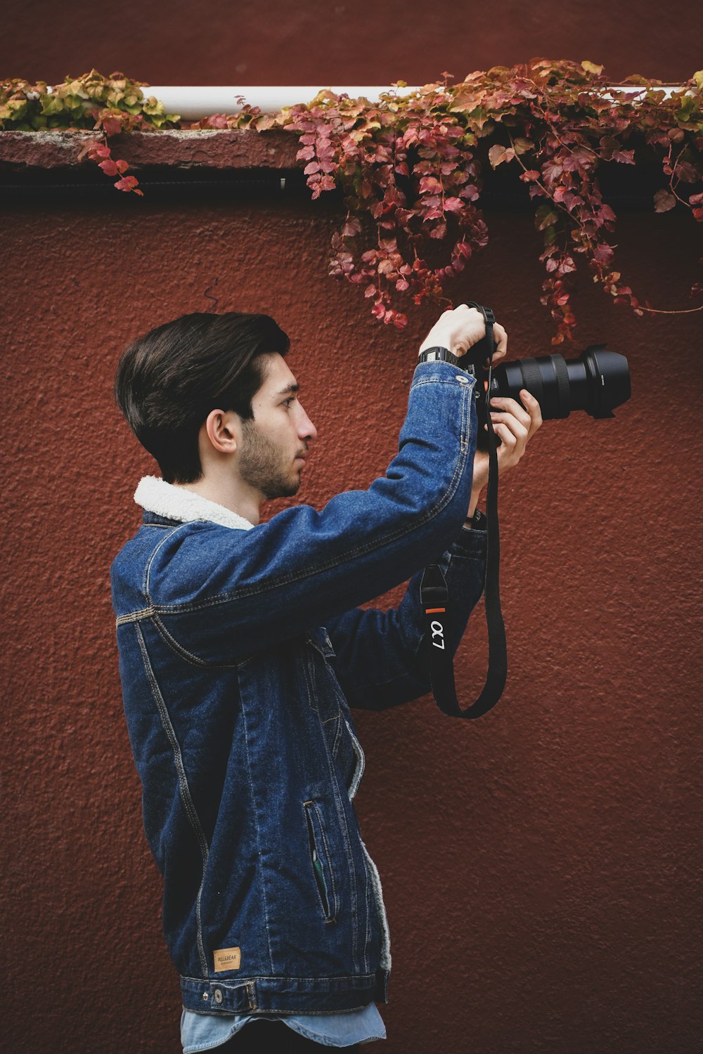 a man taking a picture with a camera