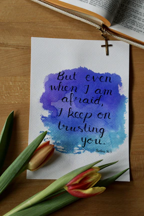 a piece of paper with a bible verse on it