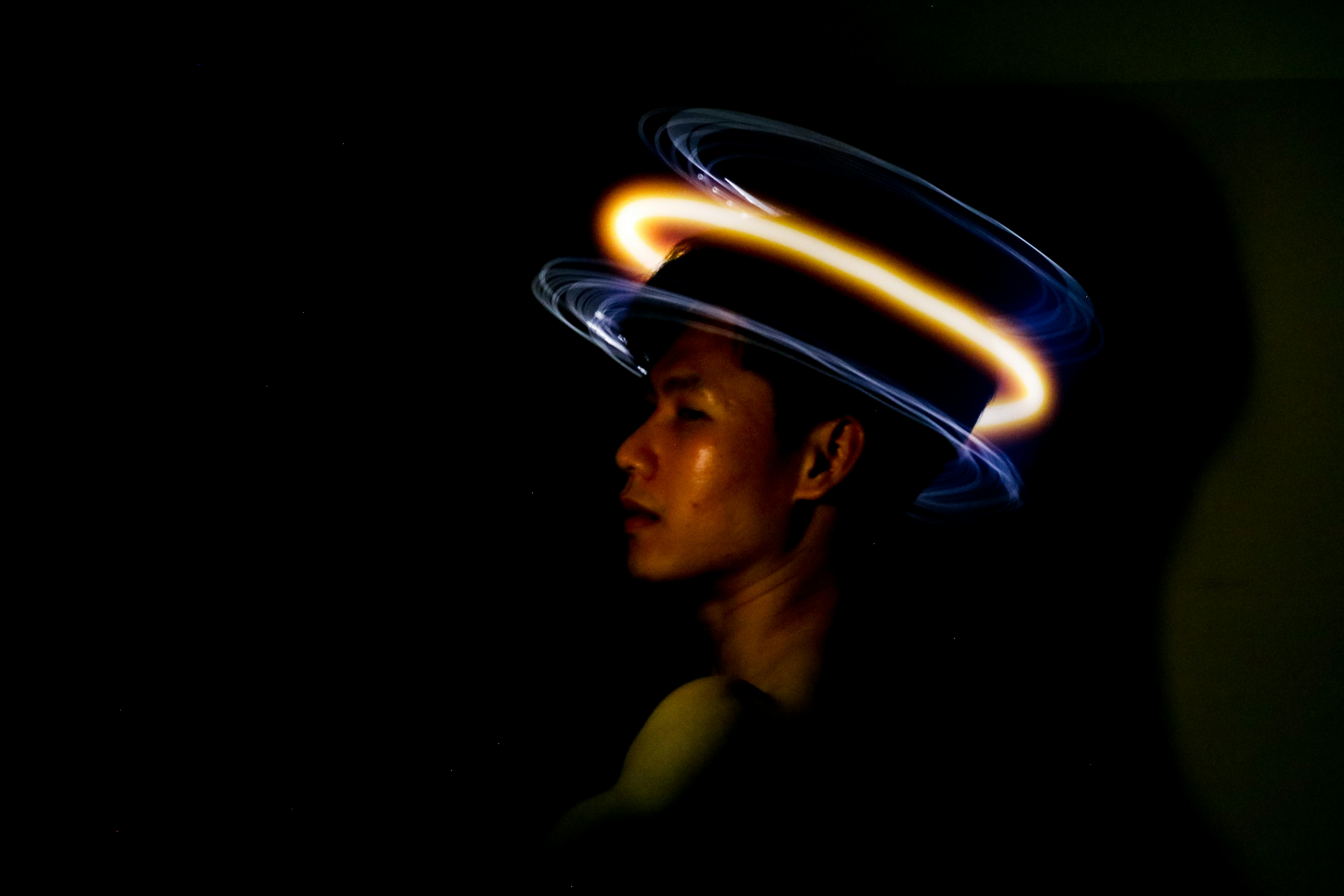 Light up LED cowboy hat glowing at a night concert festival