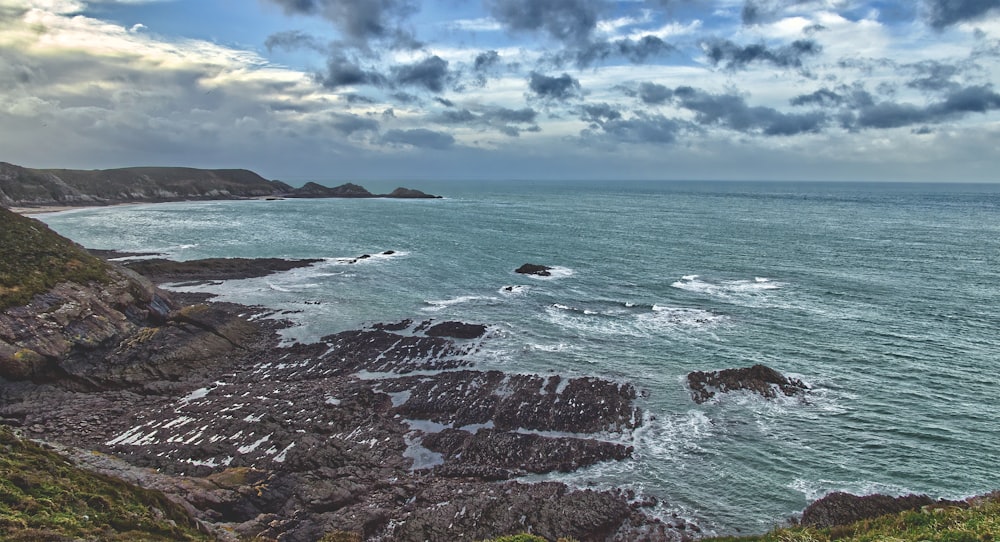 a view of the ocean from a cliff