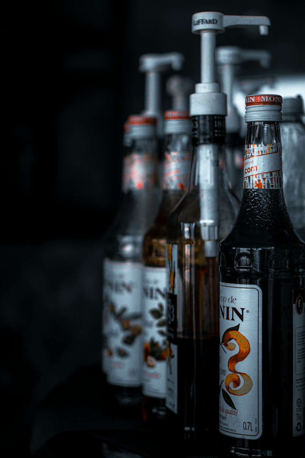 a group of bottles of beer sitting next to each other