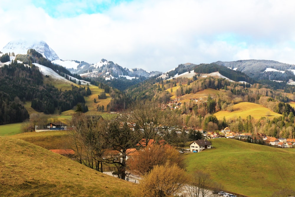 a view of a small village in the mountains