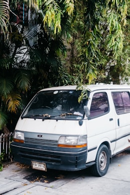 a white van parked on the side of the road