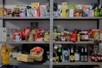 a shelf filled with lots of food items