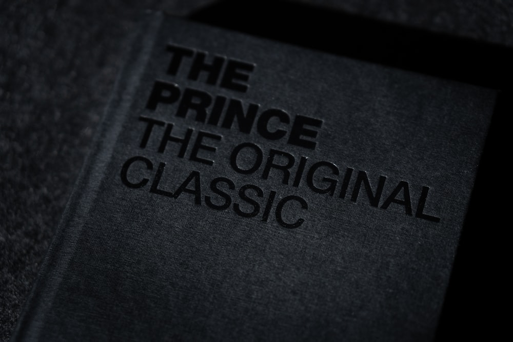 a black book with the title the prince of the original classic