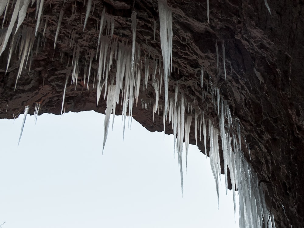 icicles hanging from the ceiling of a cave