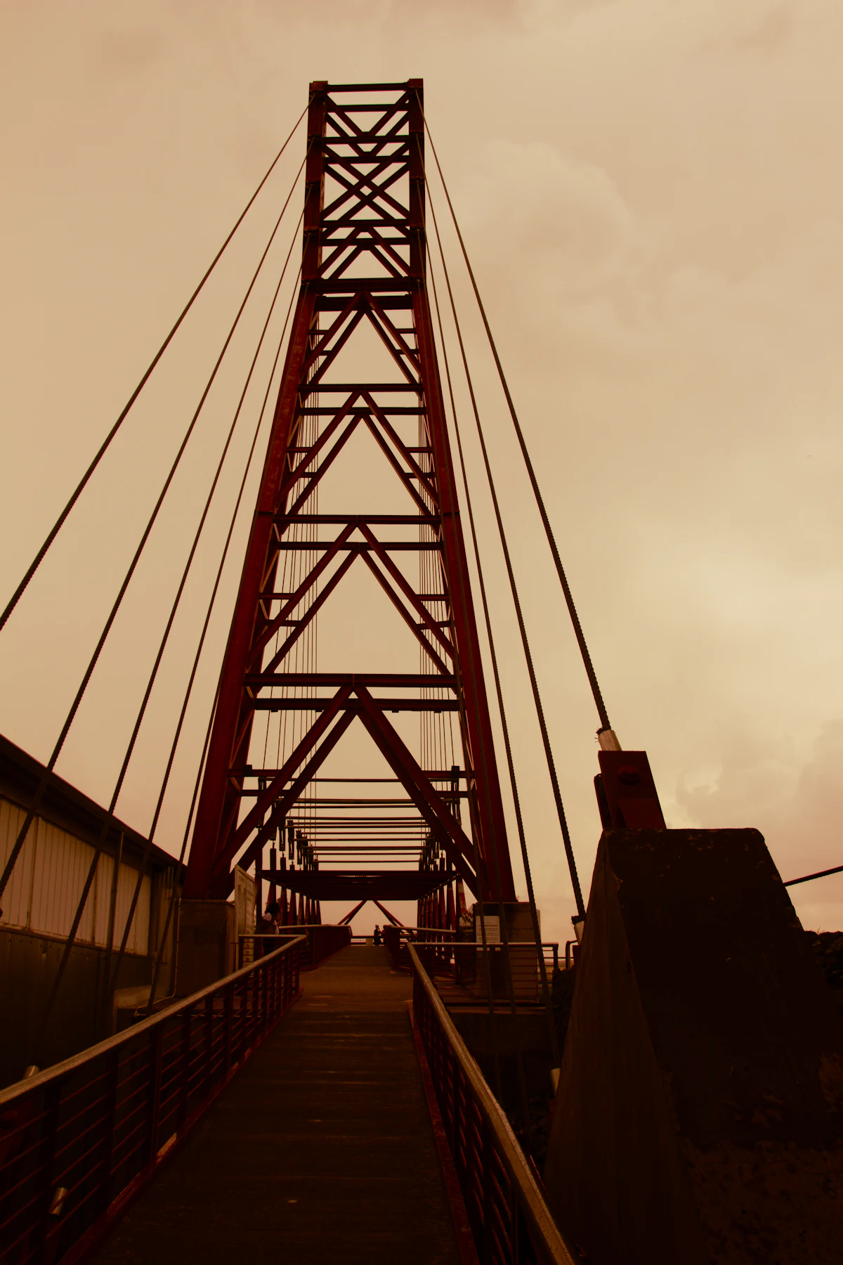 Tall red steel structure against the sky
