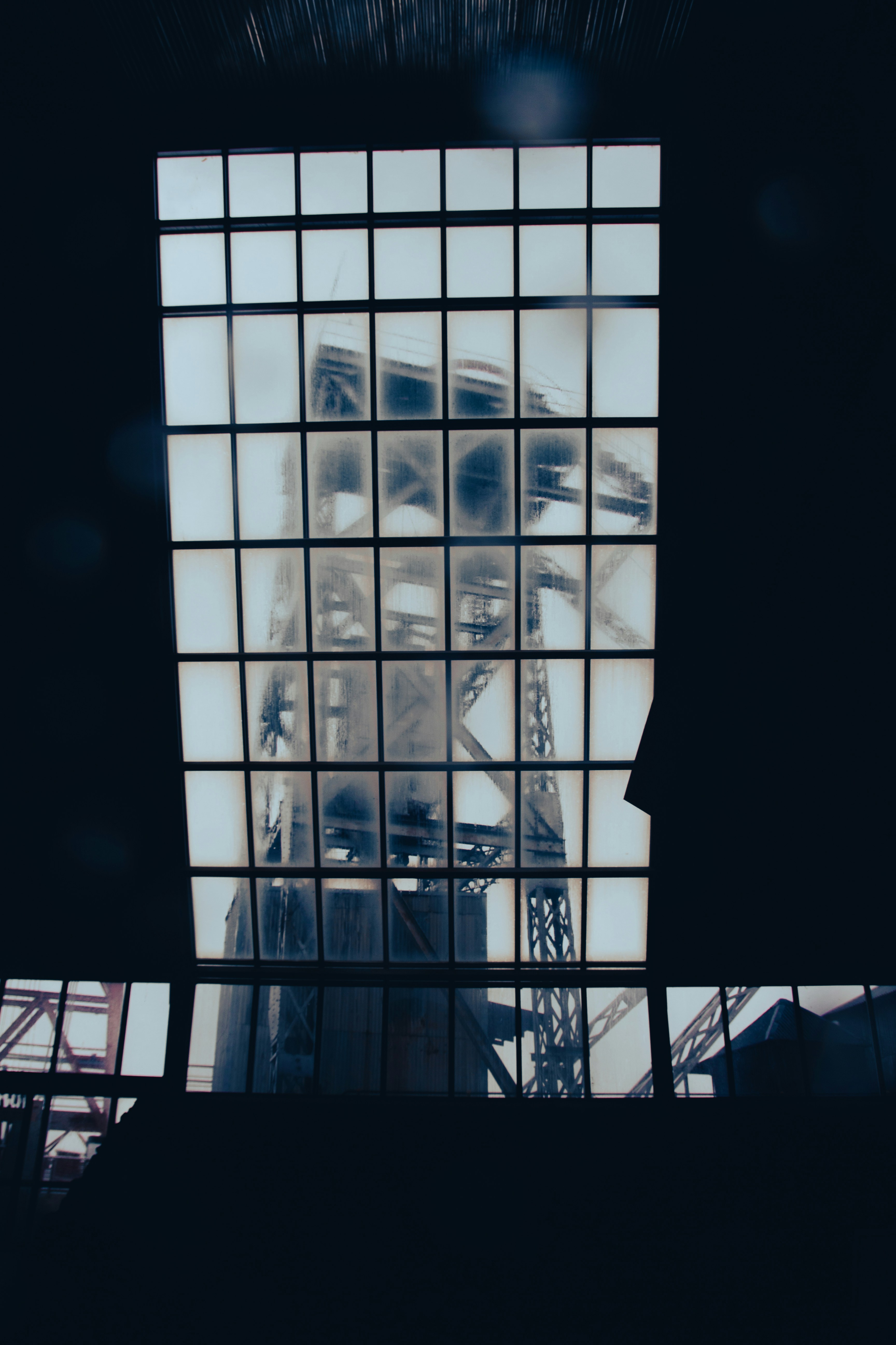 a reflection of a building in a window