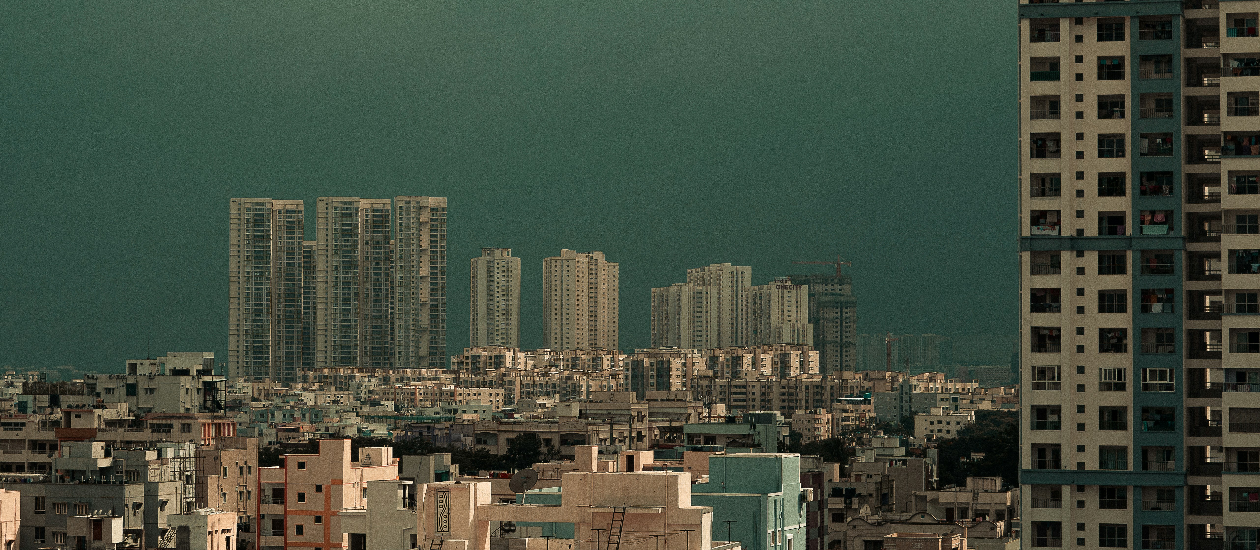 a view of a city with tall buildings