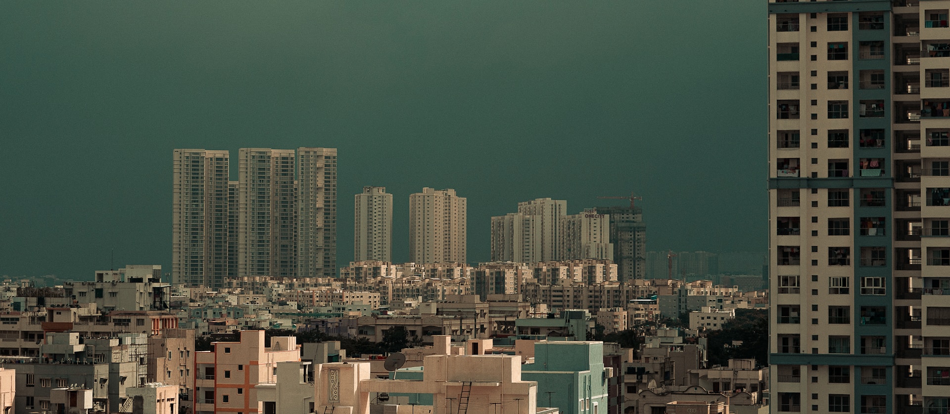 a view of a city with tall buildings