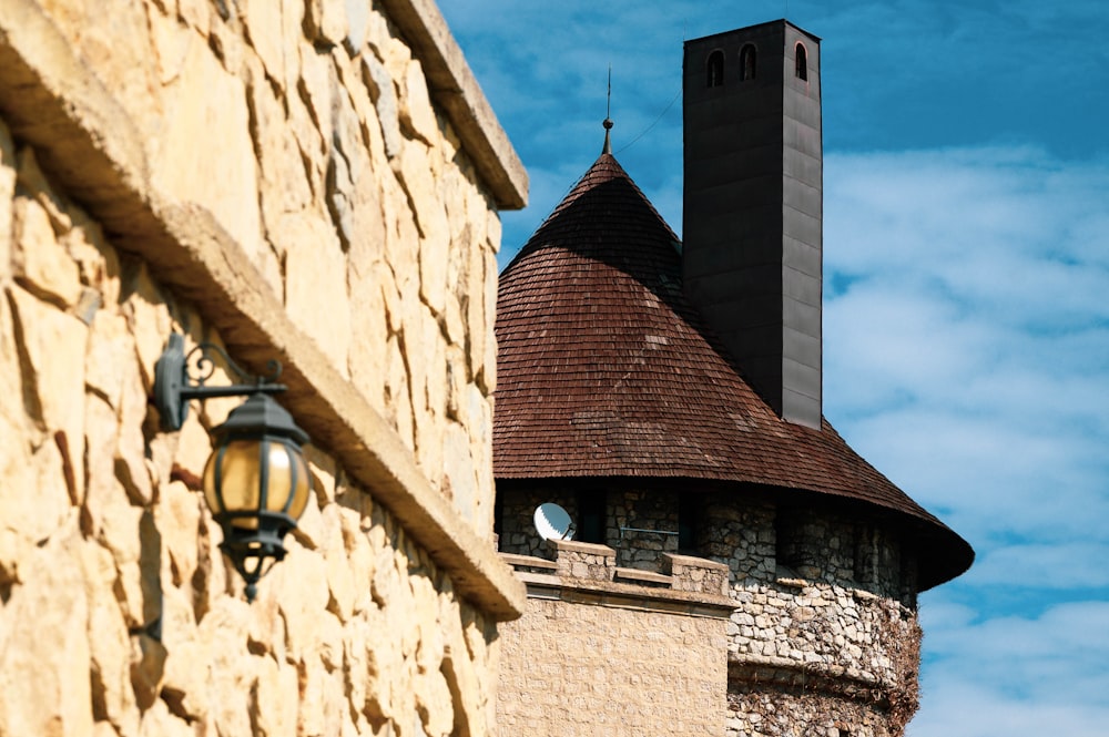 a tall tower with a clock on it's side